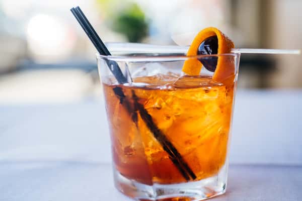 cocktail with orange peel garnish