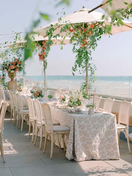 Tables and chairs decorated for a wedding