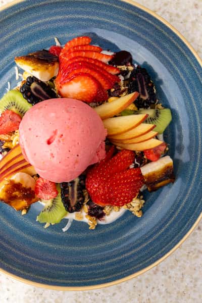 Brunch dish with sliced fruit