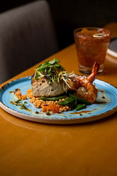 A serving of fish with shrimp