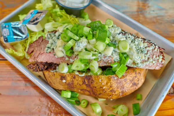 Piled high with brisket, bleu cheese crumbles, and spring onion