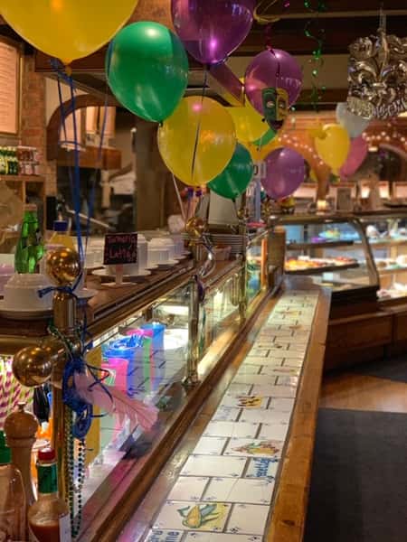 decorated bakery area with balloons