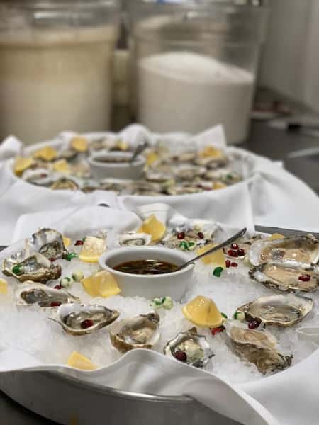 assortment of oysters on catering trays