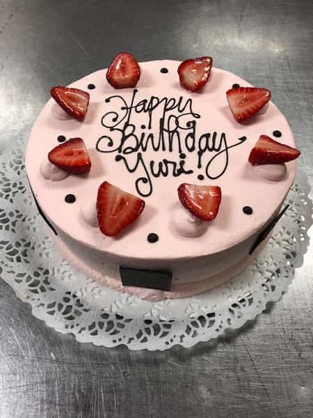 Happy Birthday Cake topped with strawberries