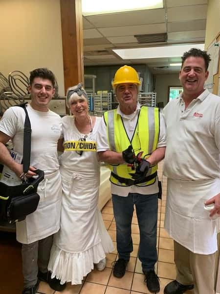 employees posing for a picture