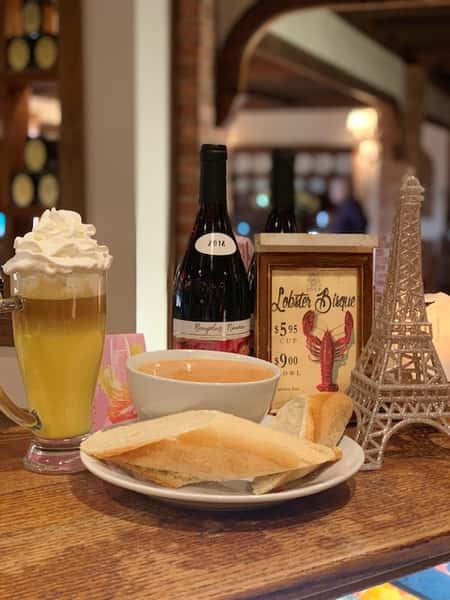 miniature eifel tower on a table with pastries