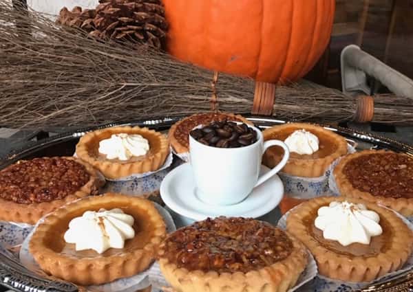 assortment of pies and a coffee cup
