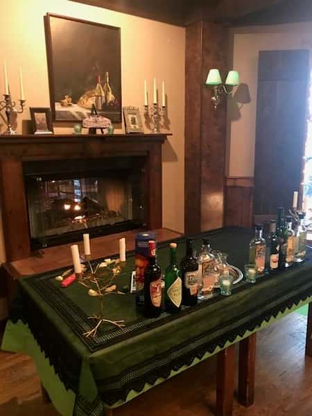 table with an assortment of alcoholic drinks