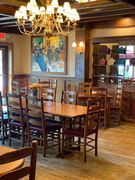dining room with table and chairs and art displayed on the wall