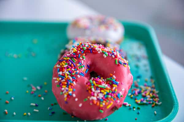 pink cake donut with rainbow sprinkles