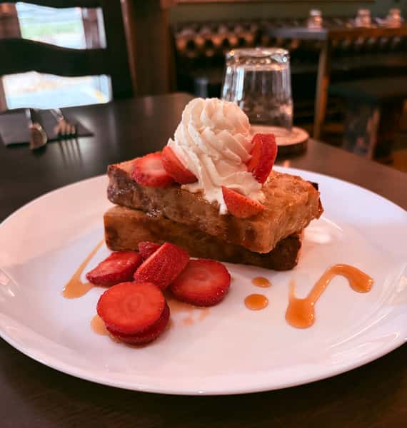 Maple Glazed French Toast Bread Pudding with Strawberries and Whip