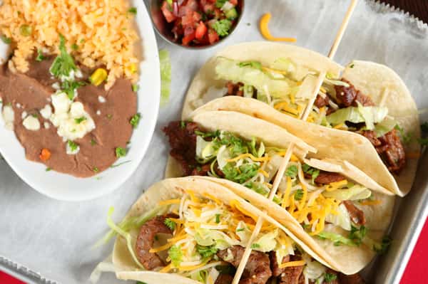 Choose two tacos and one side for $11.99
