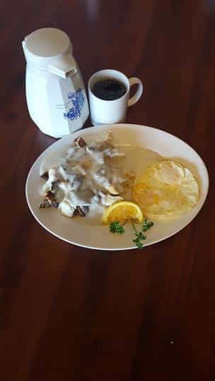 Chicken and mushrooms with gravy and eggs
