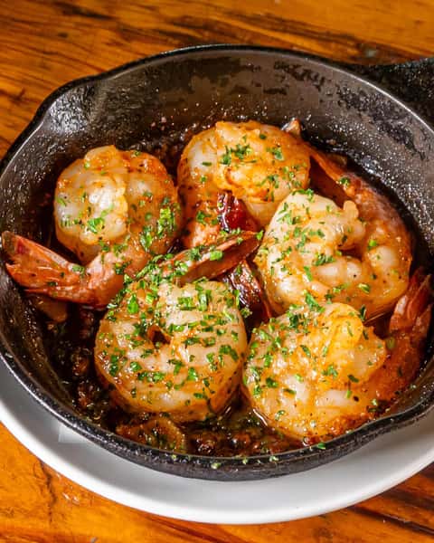 Sizzling garlic, warm olive oil, fresh shrimp