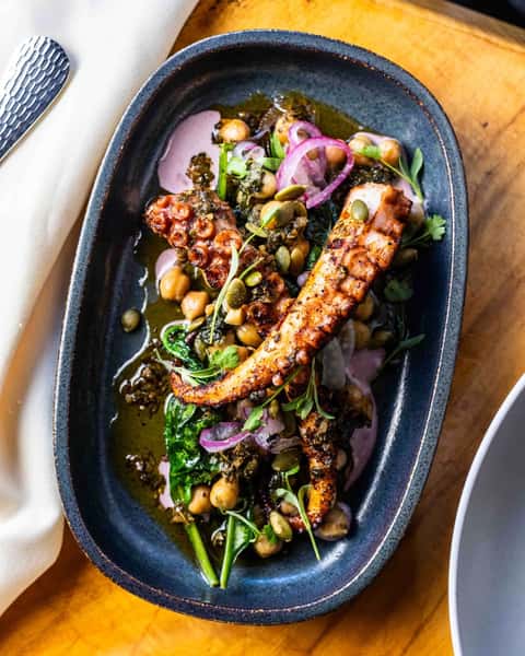octopus dish brings the essence of Spain's coastal regions to your plate.