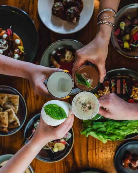 Toasts taste better with tapas on the table
