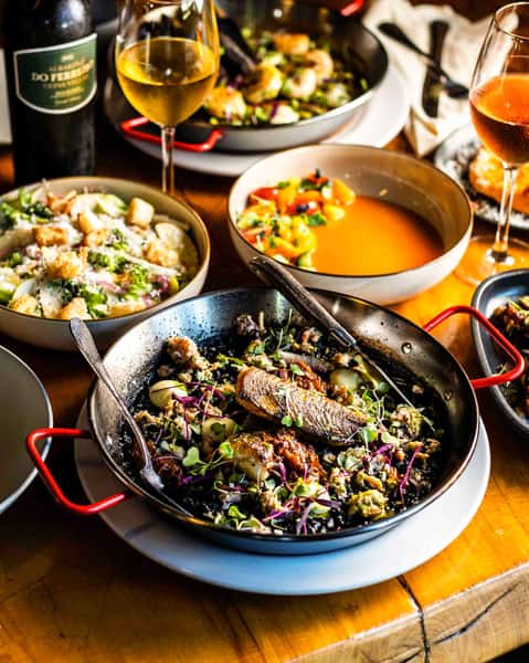 Tapas, paella, wine flowing, and a table waiting for you at El Raval