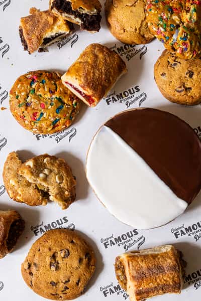Assorted cookies and rugelach on Famous 4th Street Delicatessen paper — classic Jewish-style bakery treats in Philadelphia.
