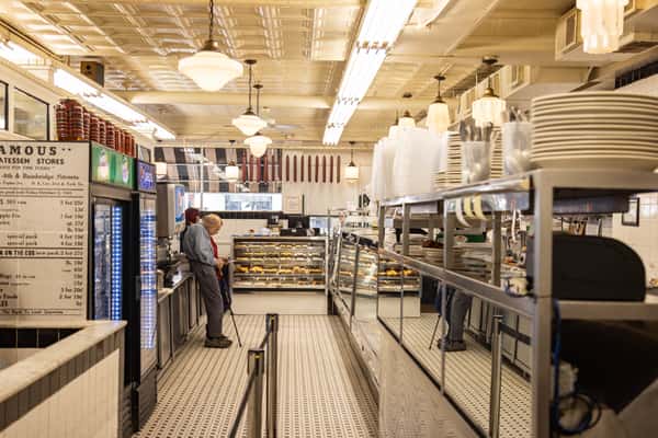 Inside Famous 4th Street Delicatessen in Philadelphia — authentic Jewish-style deli counter and bakery since 1923.