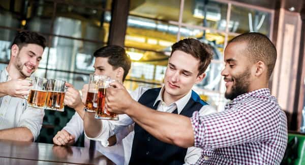 wedding party raising drinks