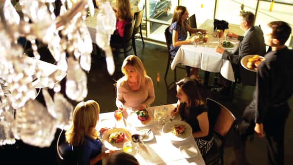 Overhead view of people dining at a table