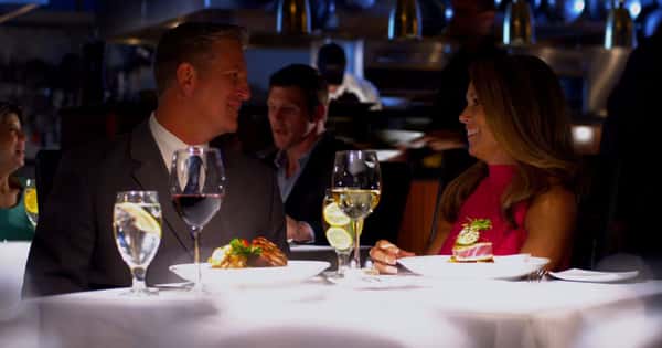 Couple enjoying food and drinks