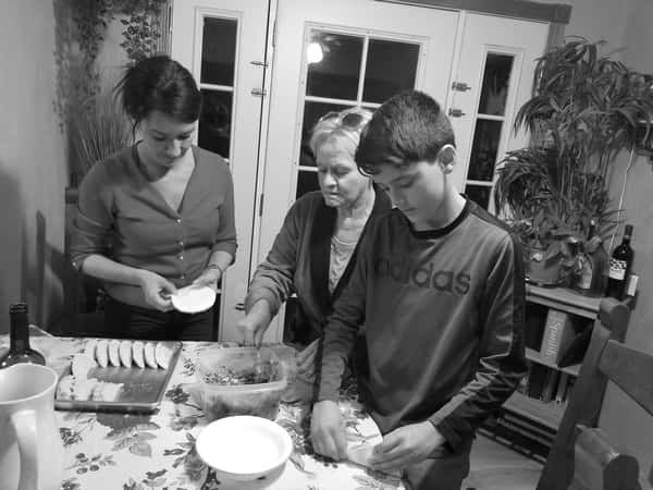 LORENA MAKING EMPANADAS WITH HER MOTHER MARIA AND SON IVAN