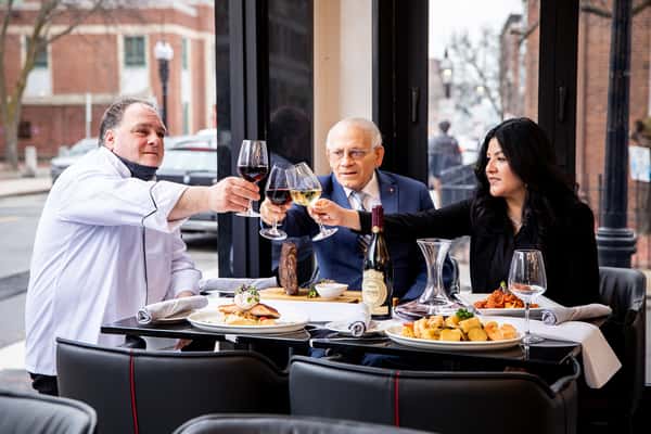 three people dining