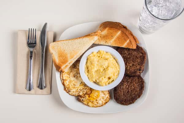 Eggs Sausage Cheesy Grits And Toast