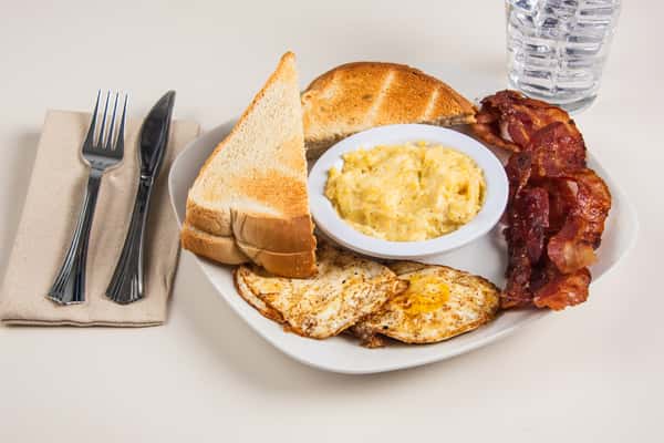 Eggs (2), Bacon(4), Cheesy Grits & Toast(2)