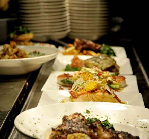 variety of food plated on kitchen counter