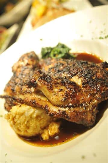 chicken dish with sauce on a plate