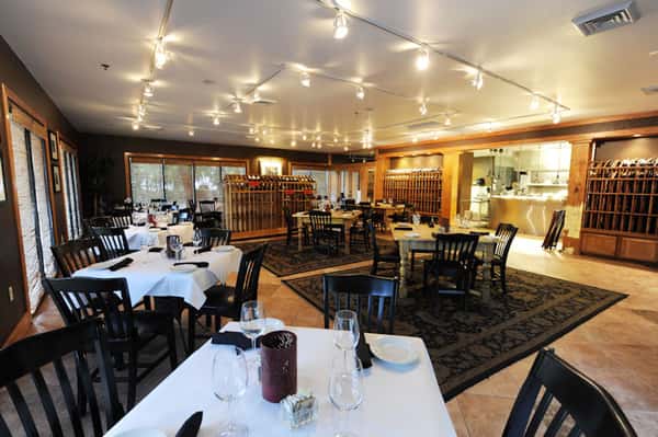 Dining Room with chairs, tables and place settings