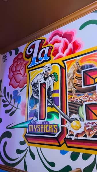 We’re so happy to finally share this beautiful mural with you all!
A special thank you to the talented, El Vrt, for bringing a piece of La Delicia & the city of Mobile together in such a meaningful way.
We’re proud to be part of this community, and this mural makes our space even more special. Stop by and see it for yourself 😃
#mural #art #wallart #paint #artist #localartist