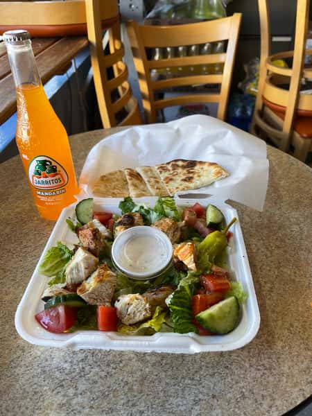 Chicken greek salad and jarritos