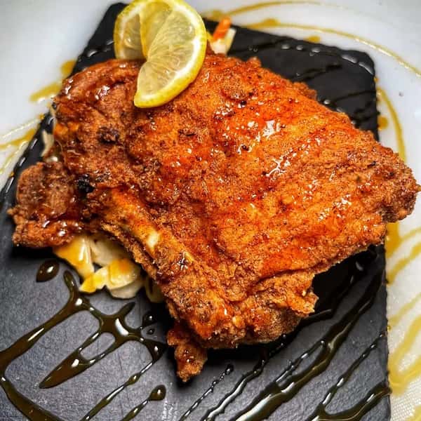 1 Fried Pork Chop with 2 Sides