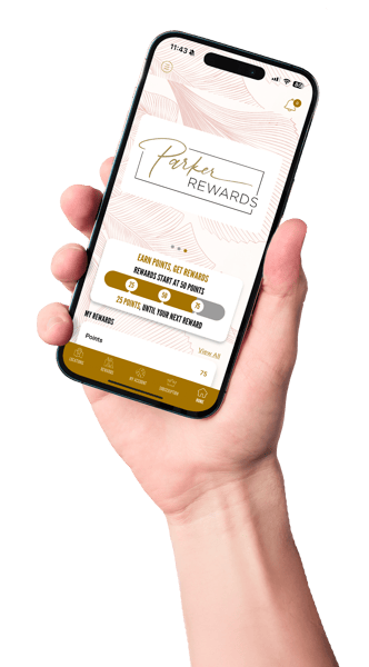 hand holding phone with app on screen
