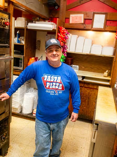 Owner in kitchen