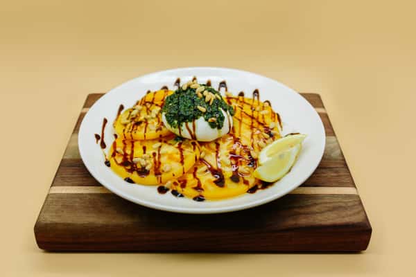 Yellow tomato and burrata