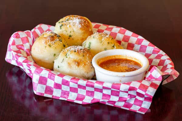 4 Garlic Knots w/4oz Sauce