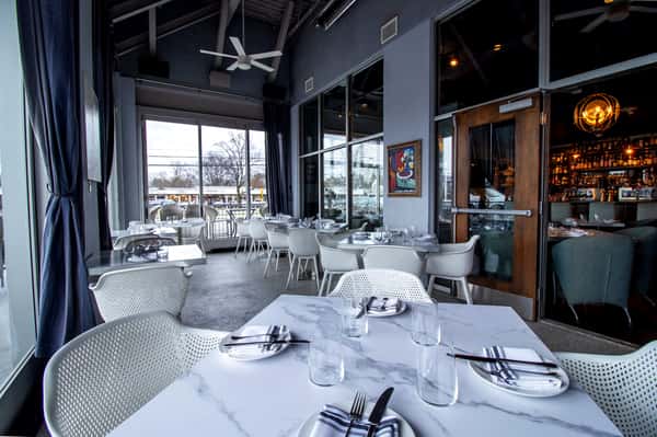 360 Bistro glass-enclosed patio set for a private buyout event