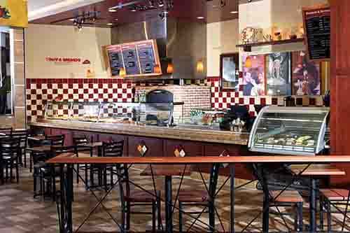 interior of the store with tables and chairs