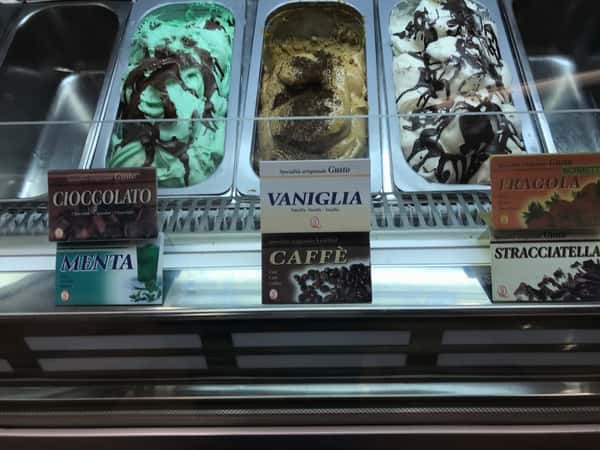 gelato case with various flavors