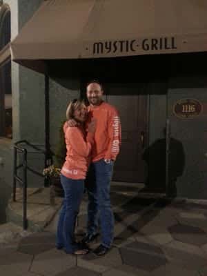 couple with Mystic Grill shirts