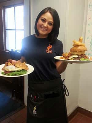 waitress with Mystic Grill food