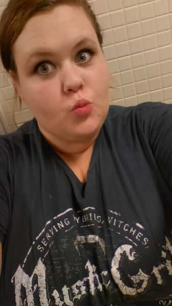 girl with Mystic Grill shirt