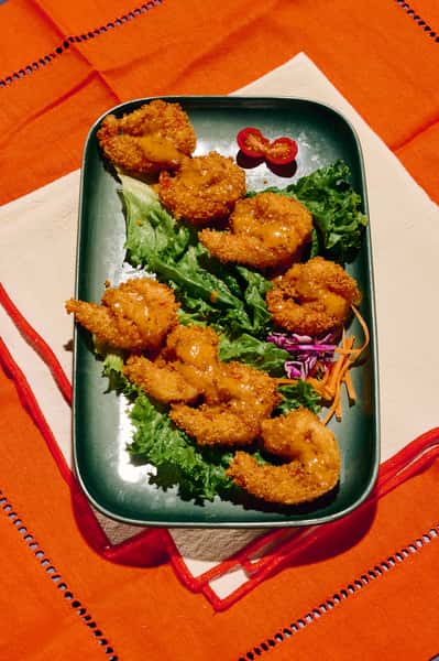 Boom! Panko-crusted Dynamite Prawns tossed in our creamy house-made Thai butter sauce.
