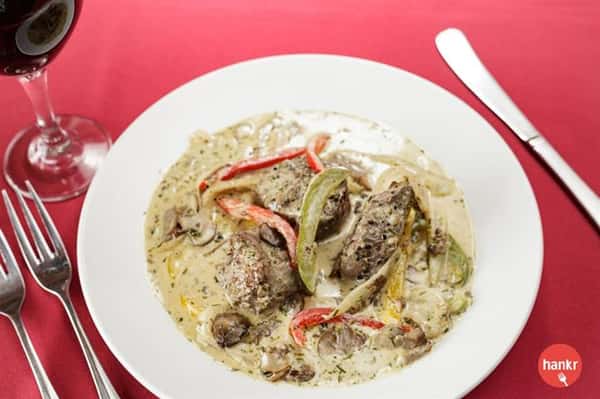 steak and vegetables in sauce