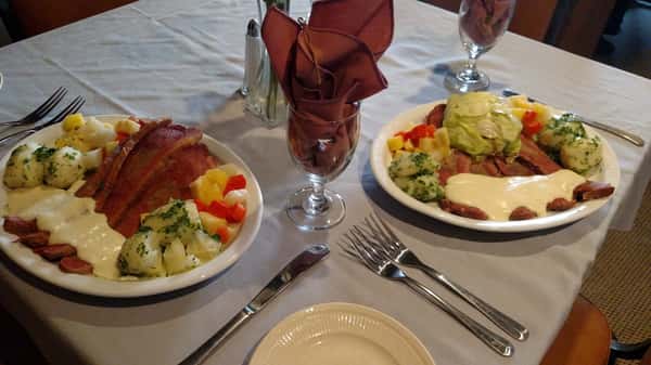 Two Chef Rene's dishes displayed on a table