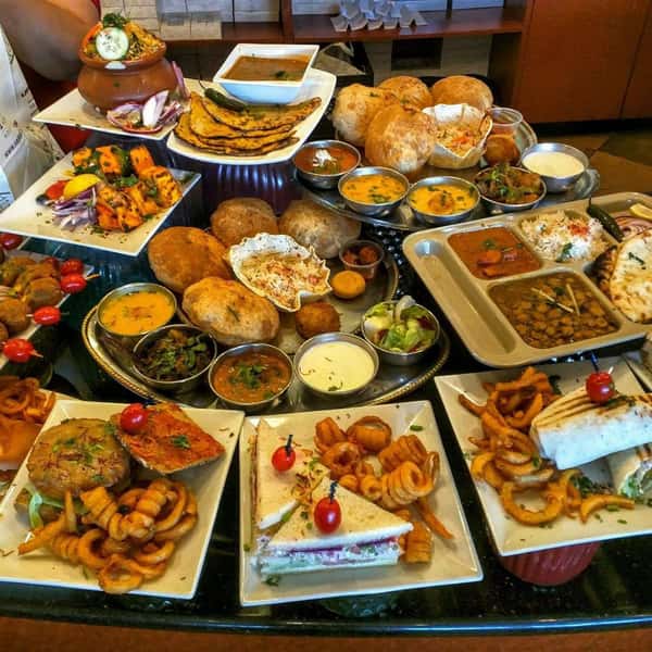 an assortment of dishes on a table